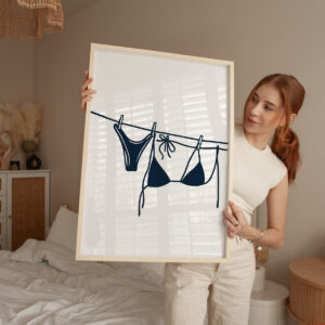 Plakat z grafiką bikini wiszącego na sznurku w minimalistycznym stylu