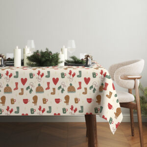 obrus świąteczny na stole z świecami i zielenią aranżacja