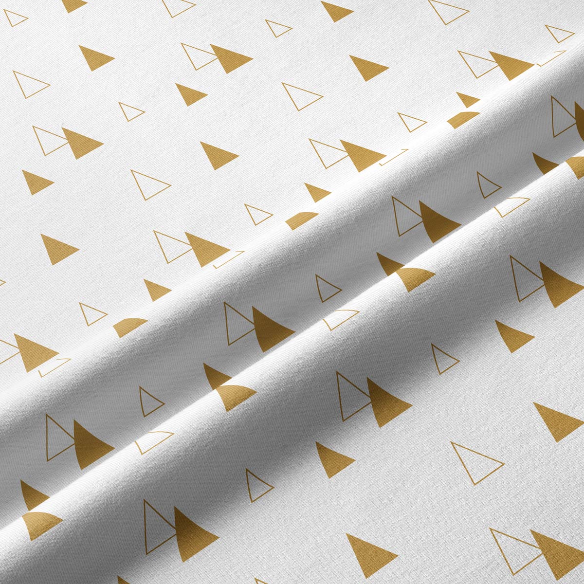 tkanina z geometrycznymi choinkami w złotym kolorze – detal materiału