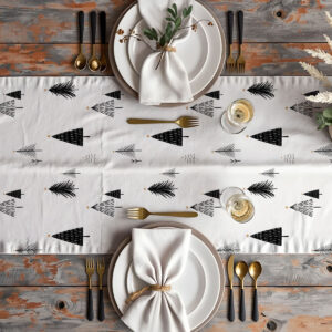aranżacja stołu z białym bieżnikiem świątecznym z minimalistycznymi choinkami