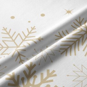 tkanina bieżnika z eleganckimi złotymi śnieżynkami