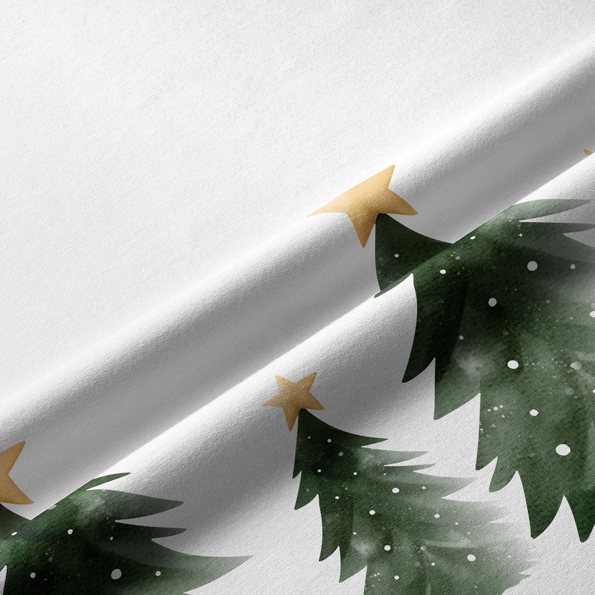 tkanina z akwarelowym wzorem choinek i złotych gwiazdek
