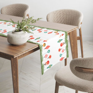 aranżacja stołu z bieżnikiem w białym kolorze z zielonymi gałązkami