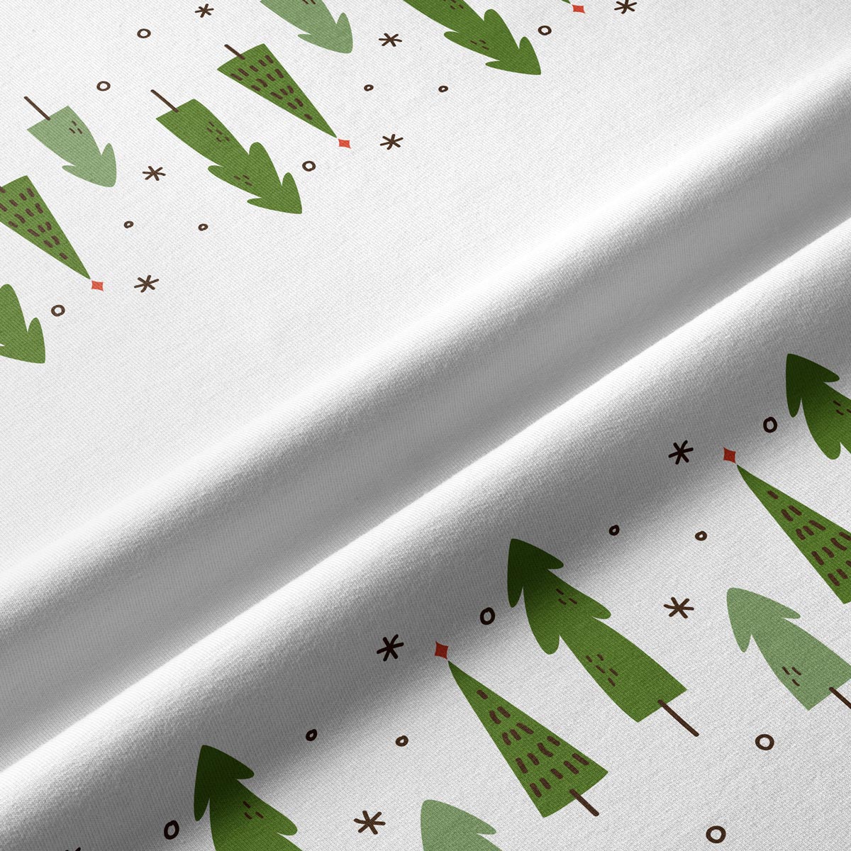tkanina z zielonym świątecznym motywem choinek