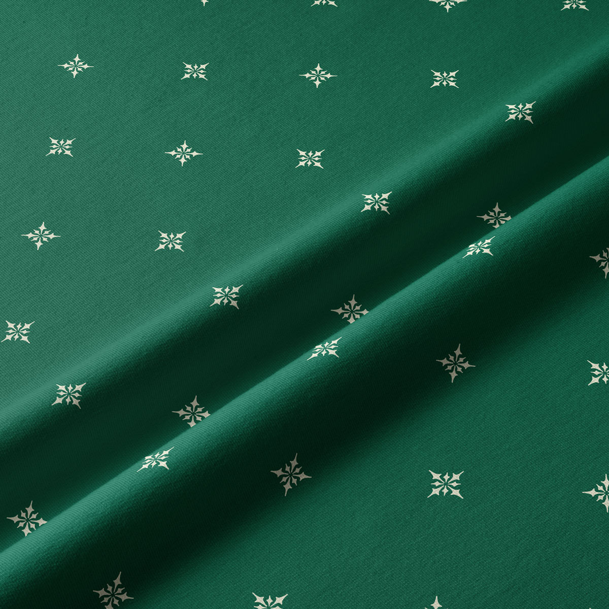 tkanina zielona z delikatnym wzorem świątecznym – detal materiału