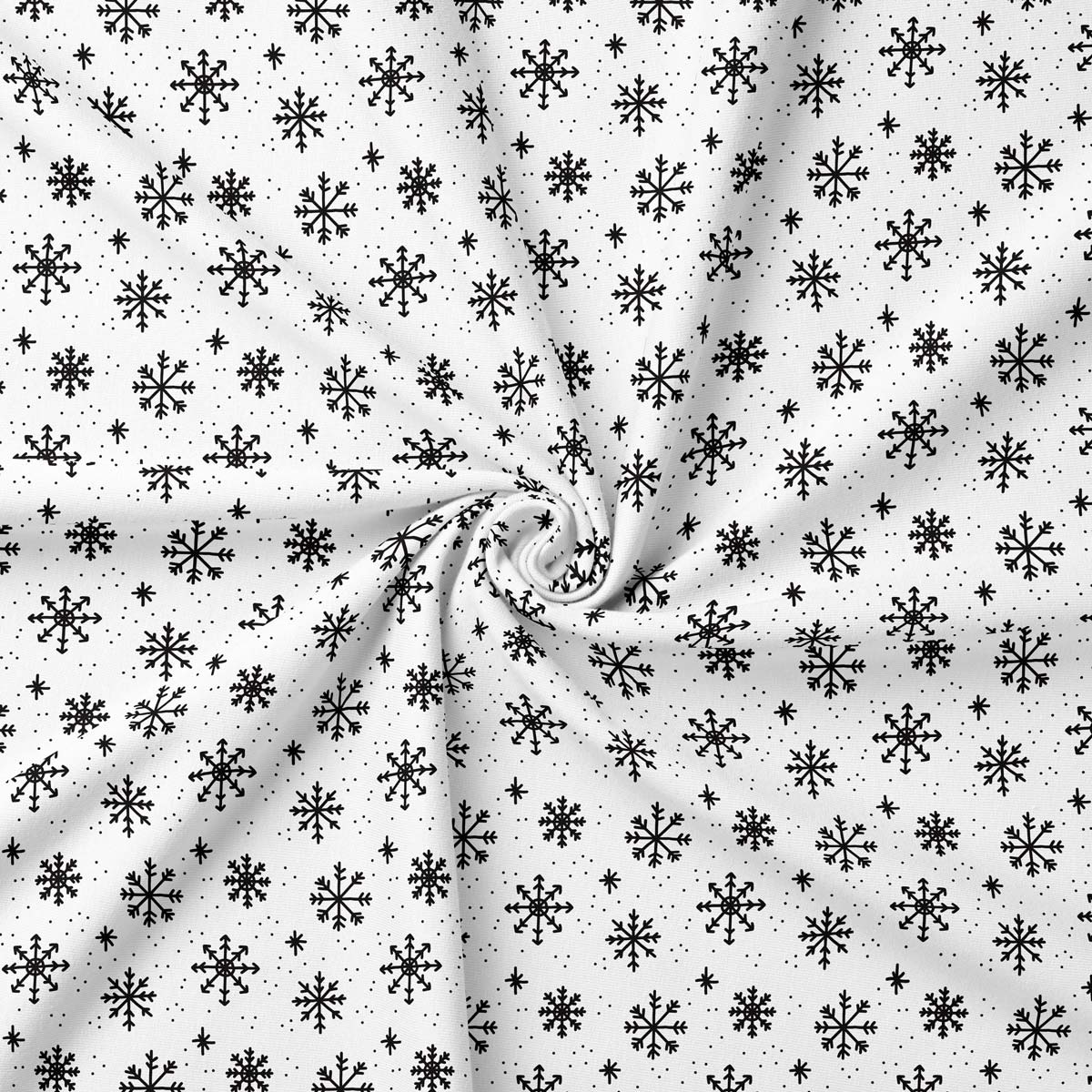 obrus zbliżenie tkaniny z czarnymi płatkami śniegu