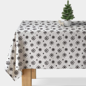 obrus biały z czarnym wzorem płatków śniegu na stole