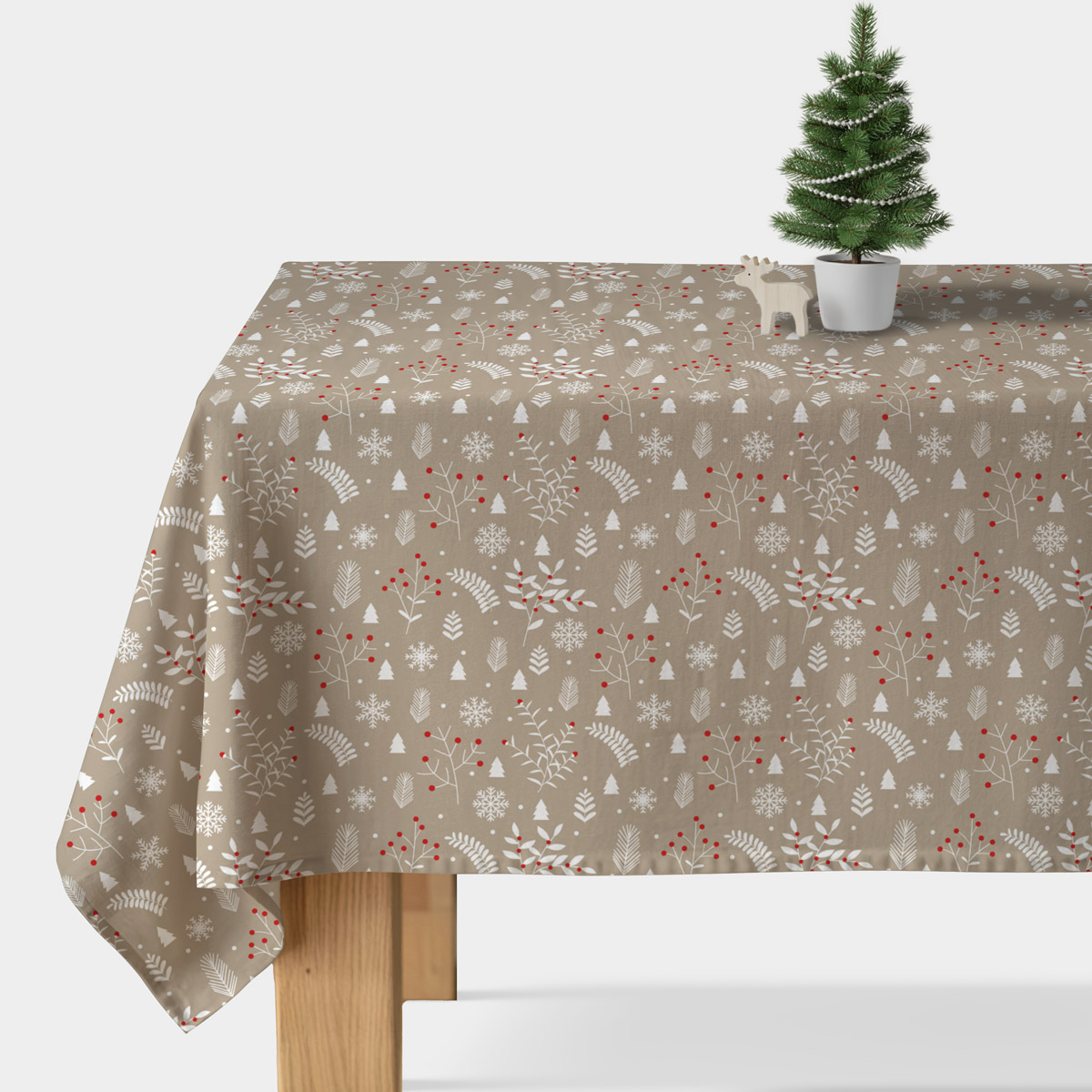 beżowy obrus z delikatnym wzorem gałązek i czerwonych owoców