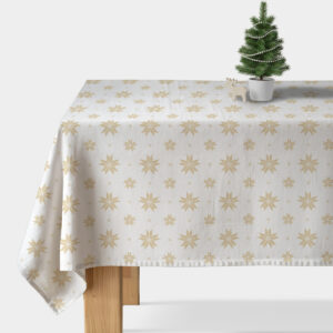 biały obrus ze złotym wzorem gwiazd na stole