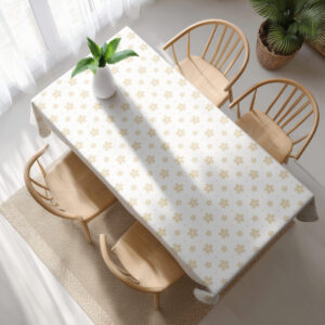 widok z góry na biały obrus ze złotym wzorem gwiazd