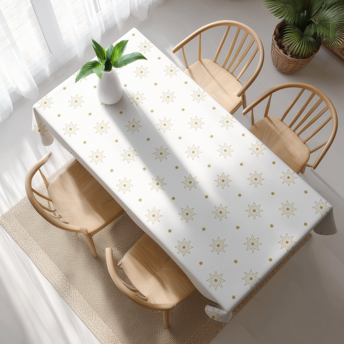 widok z góry na biały obrus świąteczny ze złotym wzorem