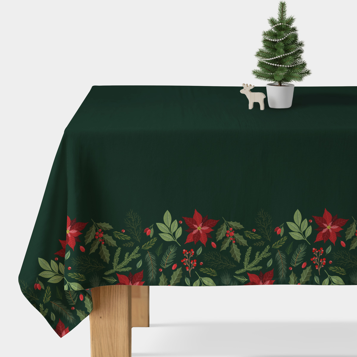 obrus świąteczny butelkowa zieleń z czerwonymi gwiazdami betlejemskimi