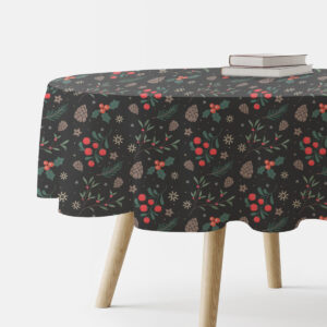 okrągły czarny obrus świąteczny z gałązkami, szyszkami i czerwonymi owocami