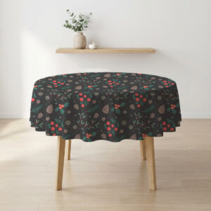 okrągły czarny obrus świąteczny z gałązkami, szyszkami i czerwonymi owocami