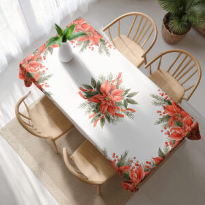 biały obrus świąteczny z czerwonymi kwiatami i zielonymi gałązkami