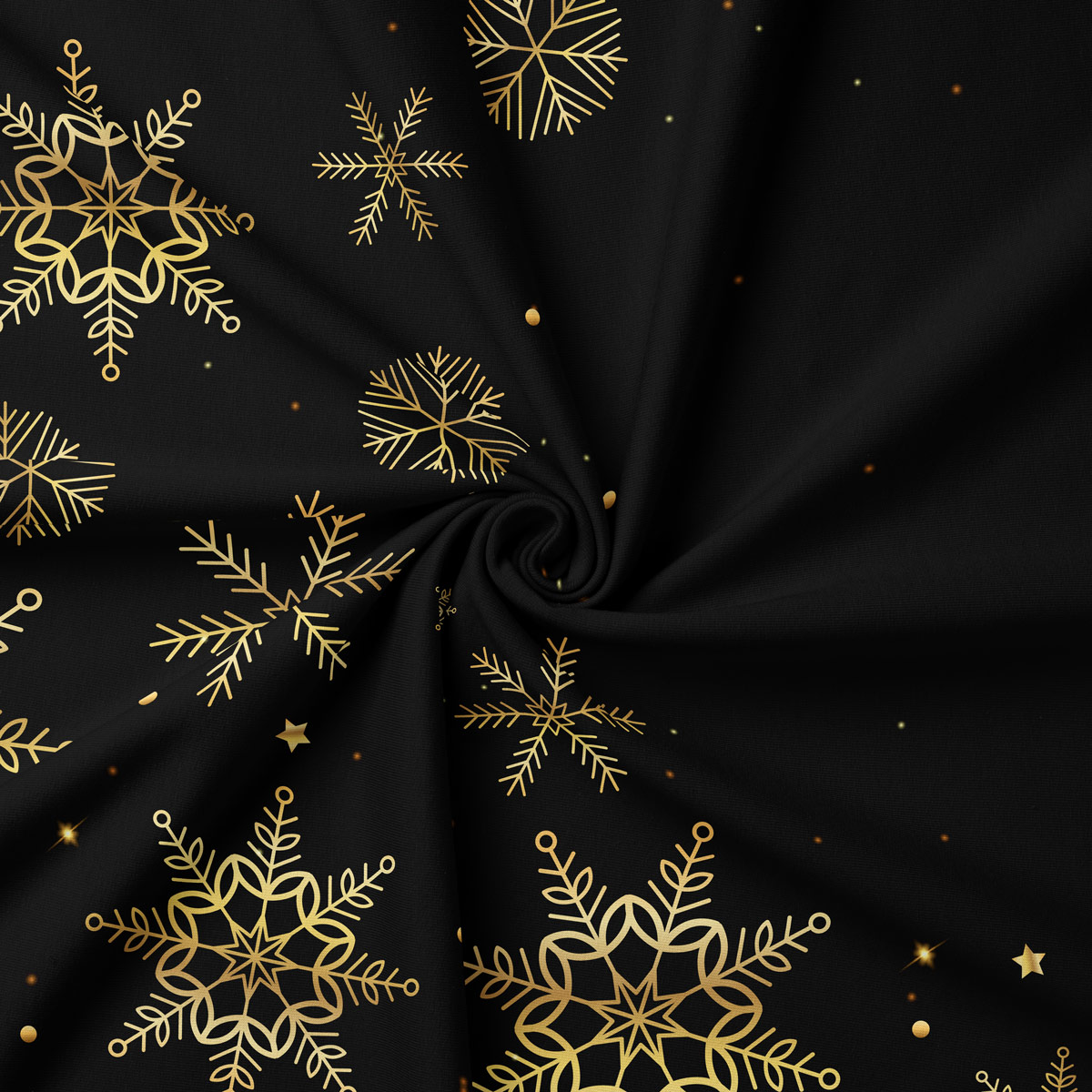 zbliżenie na tkaninę czarnego obrusu ze złotym wzorem śnieżynek