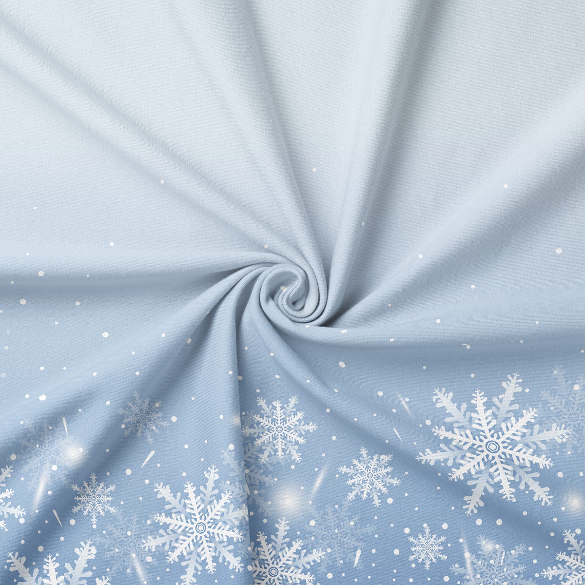 tkanina w kolorze błękitnym z motywem śnieżynek