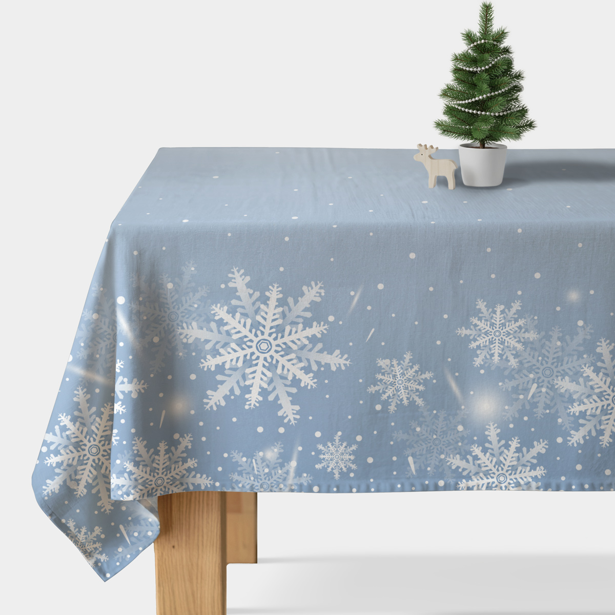 błękitny obrus zimowy z białymi śnieżynkami