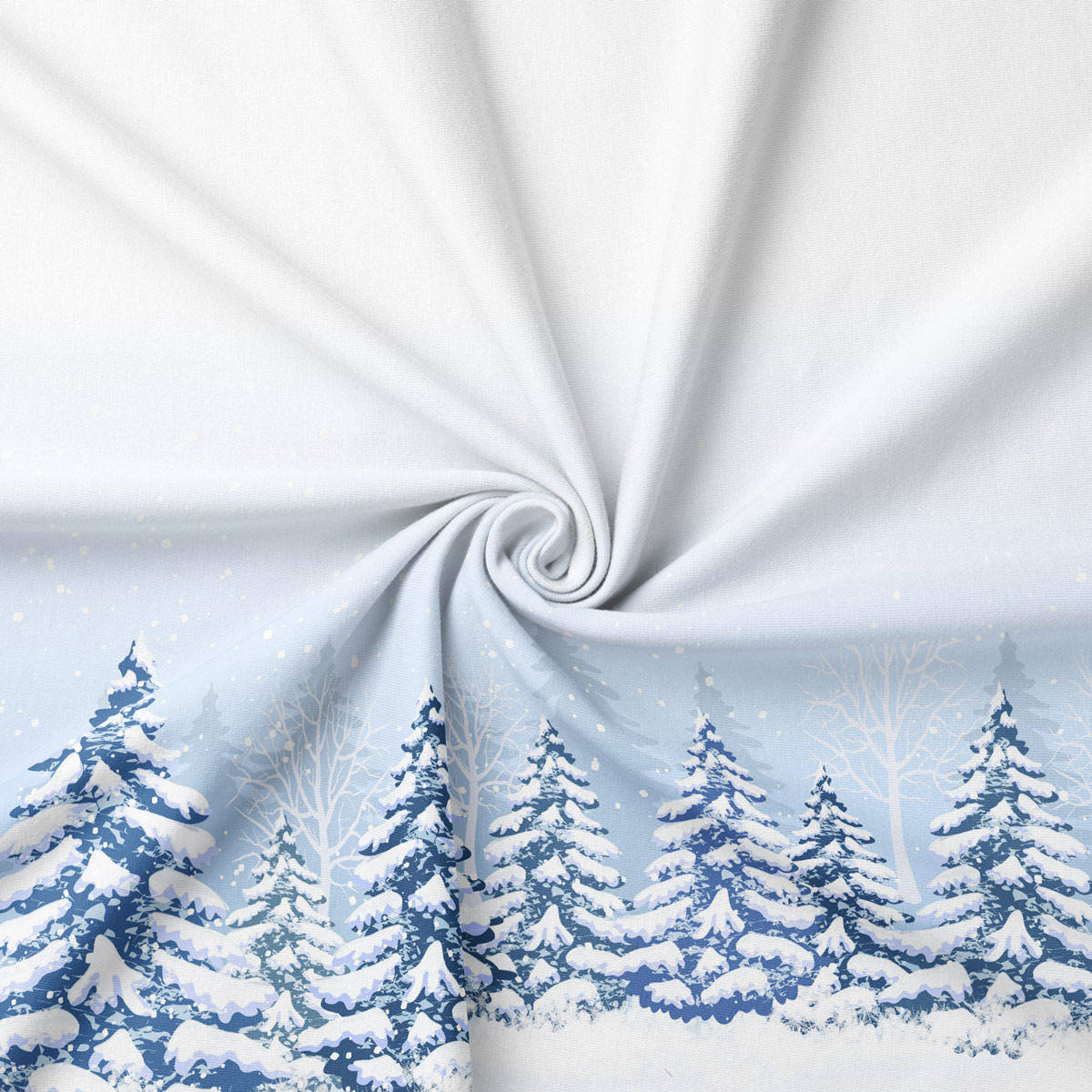tkanina z nadrukiem zimowego pejzażu i świerków
