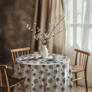 biały okrągły obrus na wymiar z czarnymi płatkami śniegu