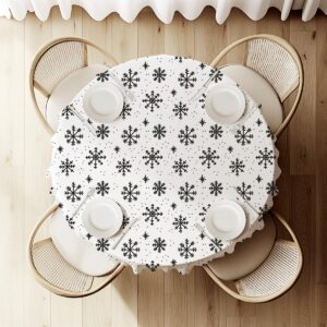 biały okrągły obrus na wymiar z czarnymi płatkami śniegu