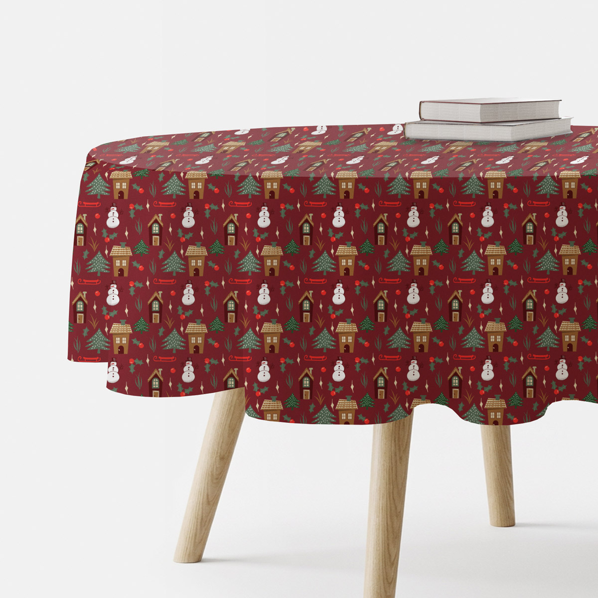 okrągły obrus świąteczny bordowy z zimowym wzorem na okrągłym stole