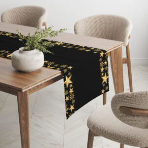 aranżacja świąteczna stołu z czarnym bieżnikiem i złotymi gwiazdkami