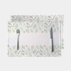 biała podkładka stołowa z gałązkami i czerwonymi jagodami