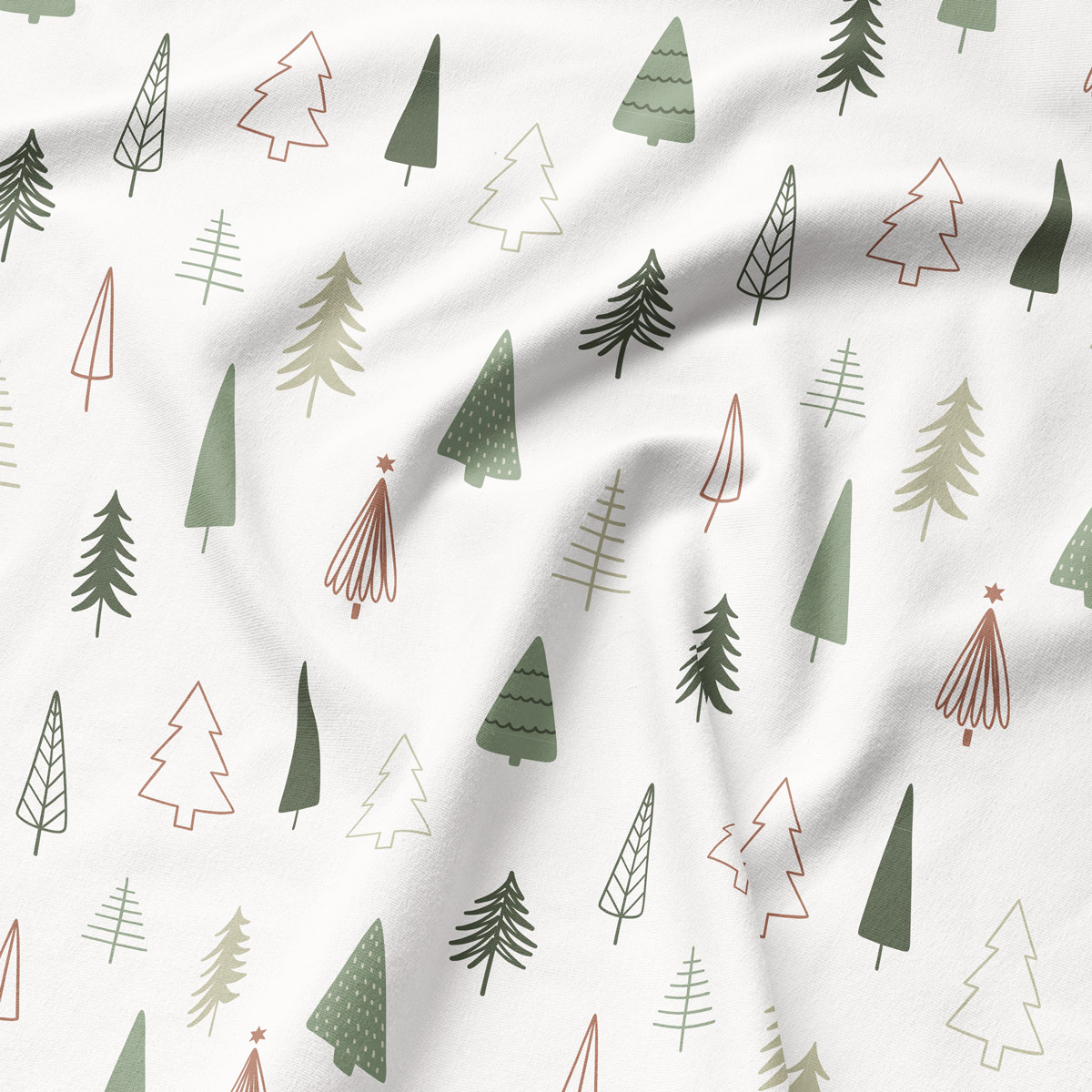 tkanina z motywem choinek w odcieniach zieleni i beżu – zbliżenie