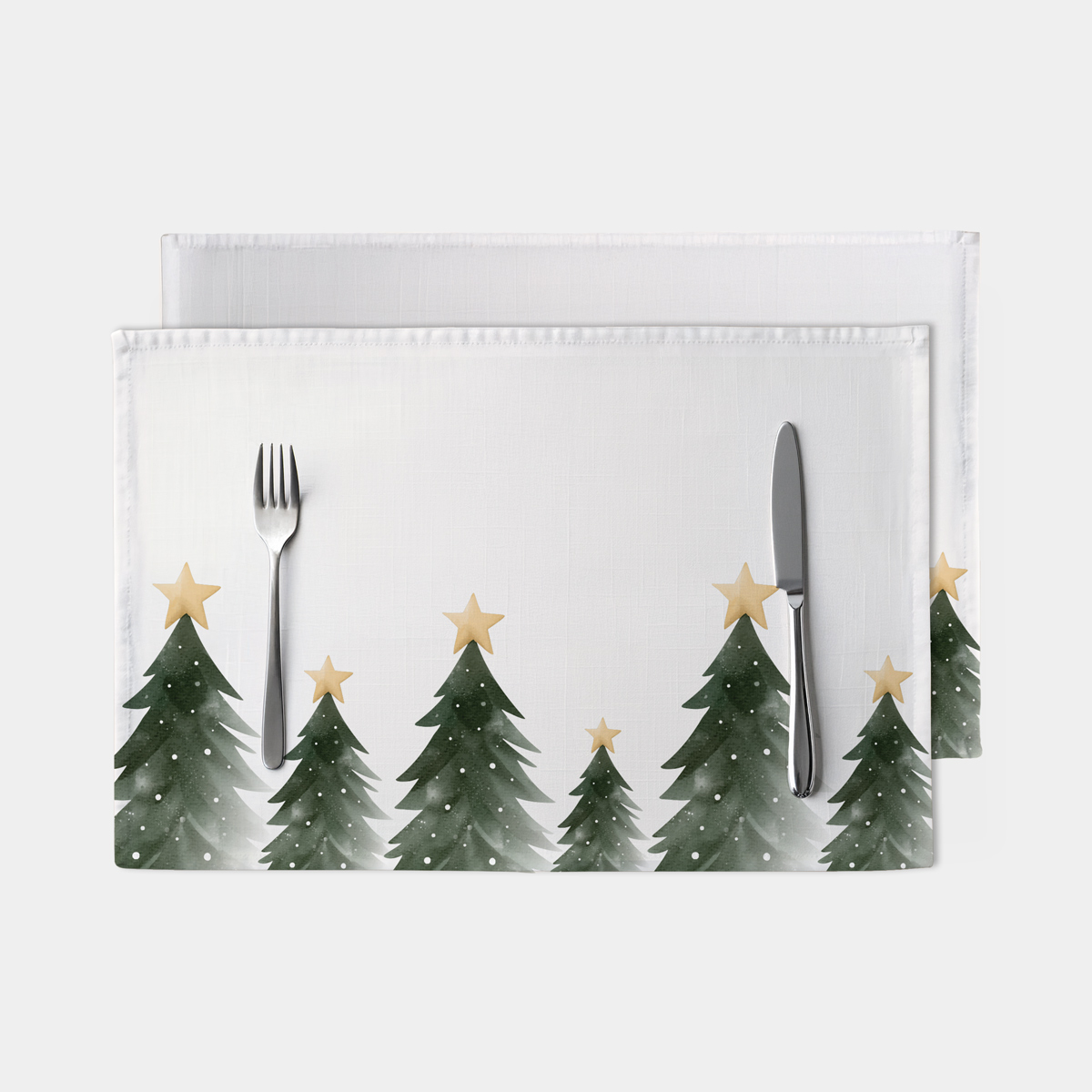 biała podkładka stołowa z choinkami i złotymi gwiazdami