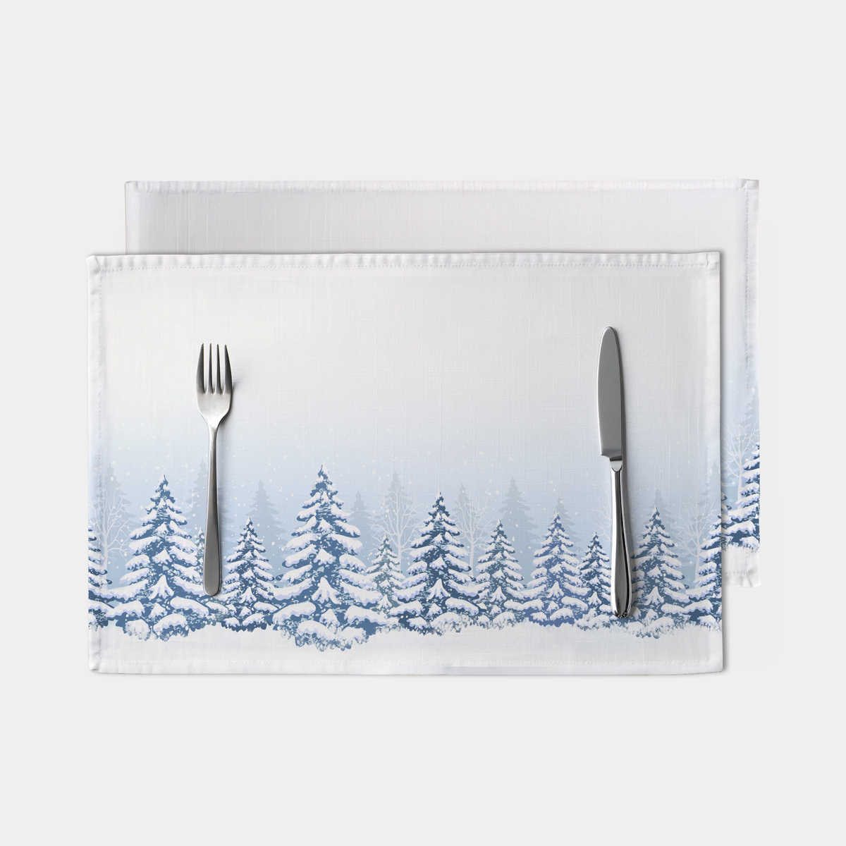 świąteczna podkładka z motywem śnieżnego lasu