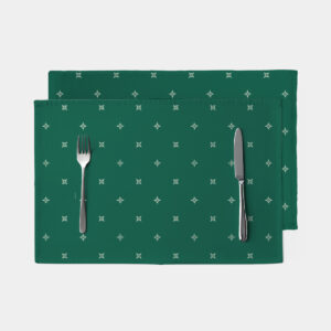 Zbliżenie tkaniny – zielona tkanina z drobnym klasycznym wzorem.