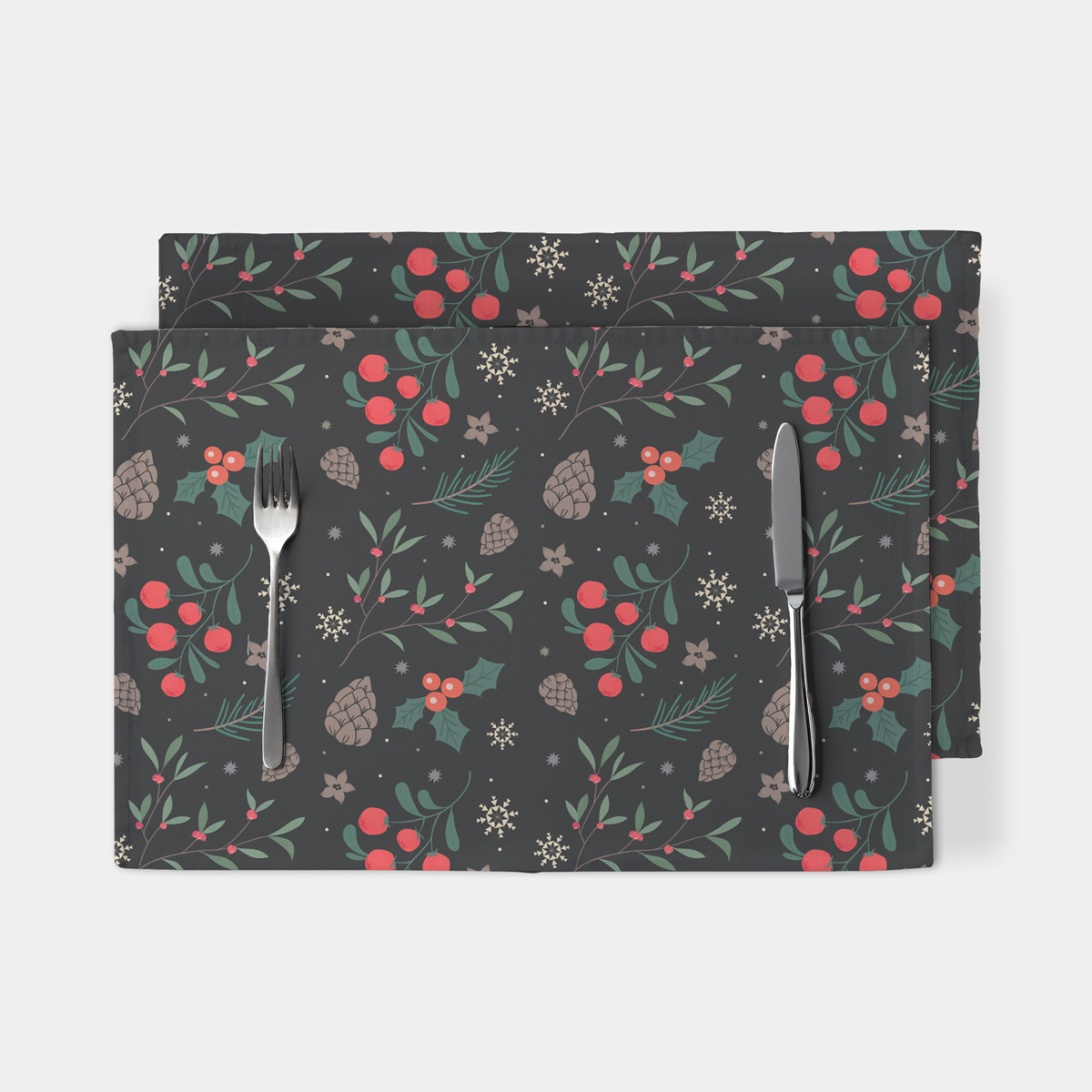 czarna podkładka świąteczna z gałązkami i czerwonymi owocami