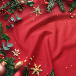 podkładka stołowa z czerwonym tłem i złotymi śnieżynkami