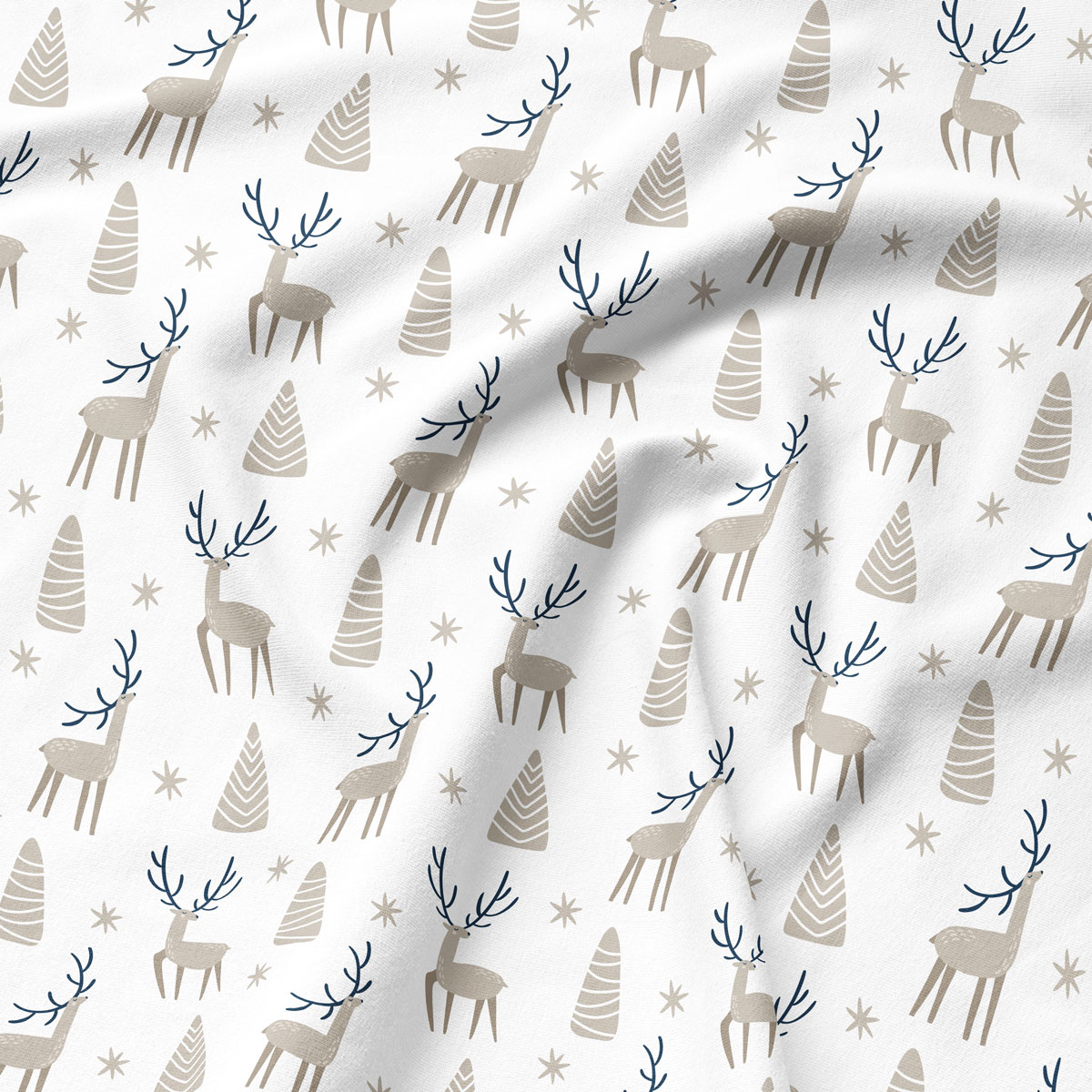 Tkanina z beżowym wzorem reniferów – zbliżenie