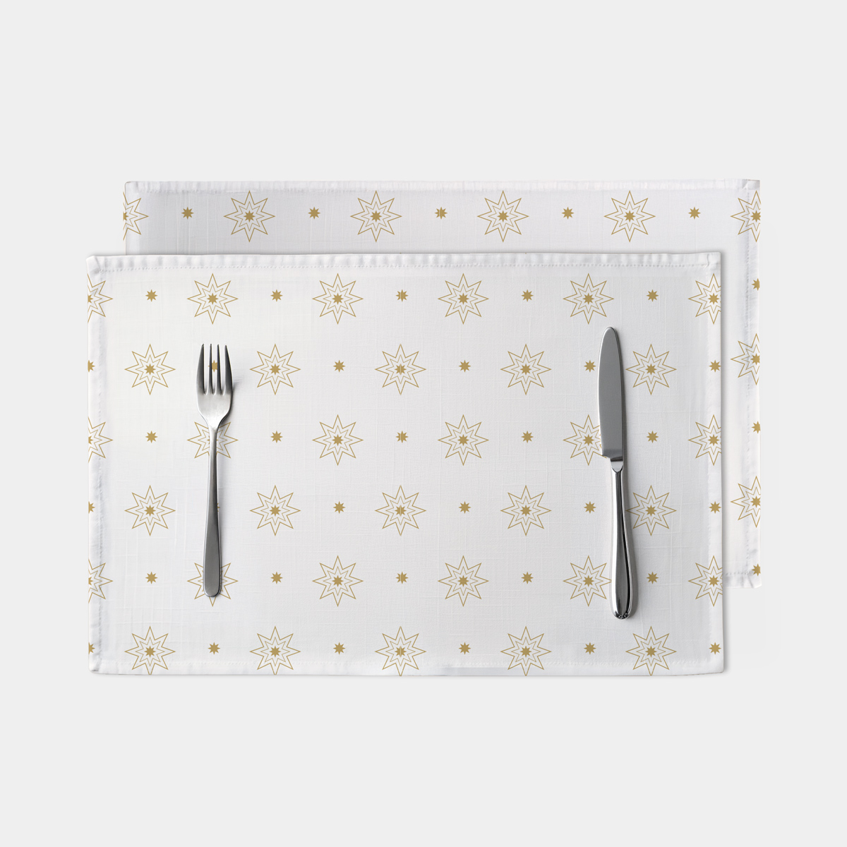 biała świąteczna podkładka z motywem złotych gwiazd