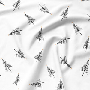 wzór czarnych choinek na białej tkaninie