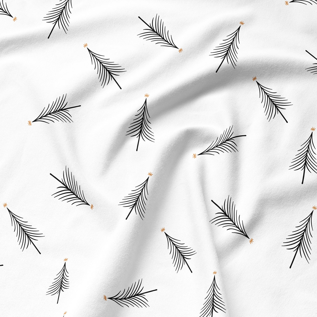 wzór czarnych choinek na białej tkaninie