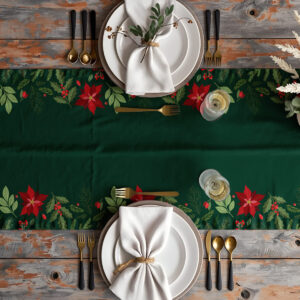 dekoracja stołu z zielonym bieżnikiem świątecznym i czerwonymi poinsecjami