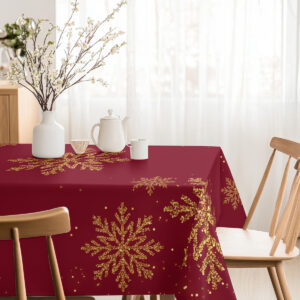 dekoracyjny obrus zimowy ze złotymi śnieżynkami