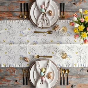 Jasny bieżnik wielkanocny w króliczki jako dekoracja stołu