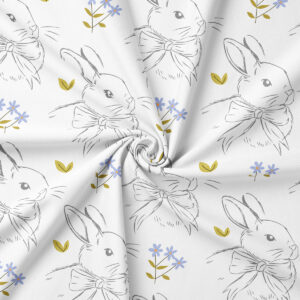 Zbliżenie na wzór obrusu wielkanocnego z królikami i kwiatami