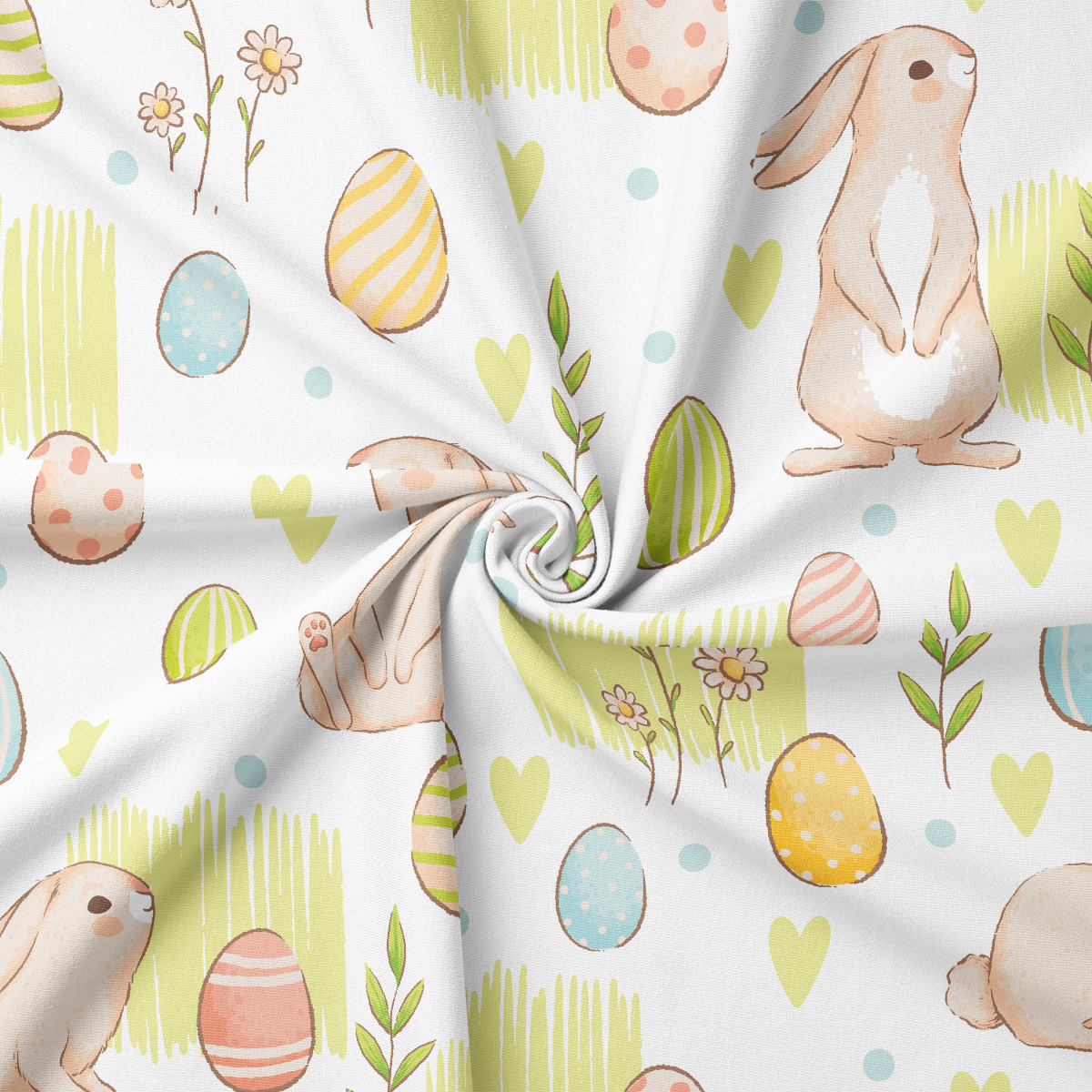 Detal tkaniny – wzór króliczków i pisanek na obrusie wielkanocnym