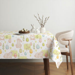 Świąteczny stół z obrusem wielkanocnym z motywem króliczków