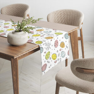 Bieżnik rozciągnięty na drewnianym stole z doniczką i krzesłami, pokazujący wzór w kontekście jadalni
