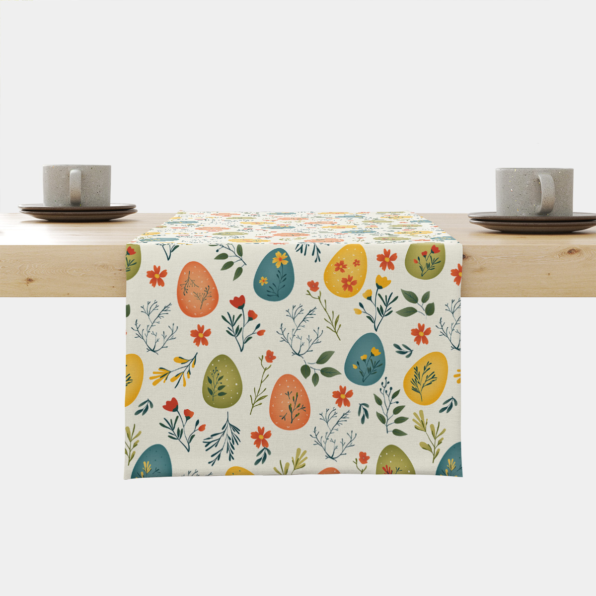 Bieżnik rozłożony na stole z motywem kolorowych pisanek i drobnych kwiatów, ujęcie główne