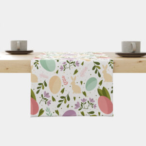 Bieżnik na stole z pastelowym wzorem pisanek i zajączków, widok frontalny