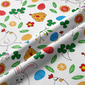 Zbliżenie na kolorowy nadruk z pisankami, liśćmi i kwiatami na tkaninie bieżnika