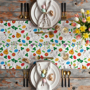 Bieżnik w aranżacji stołu z nakryciami, złotymi sztućcami i wiosennymi tulipanami