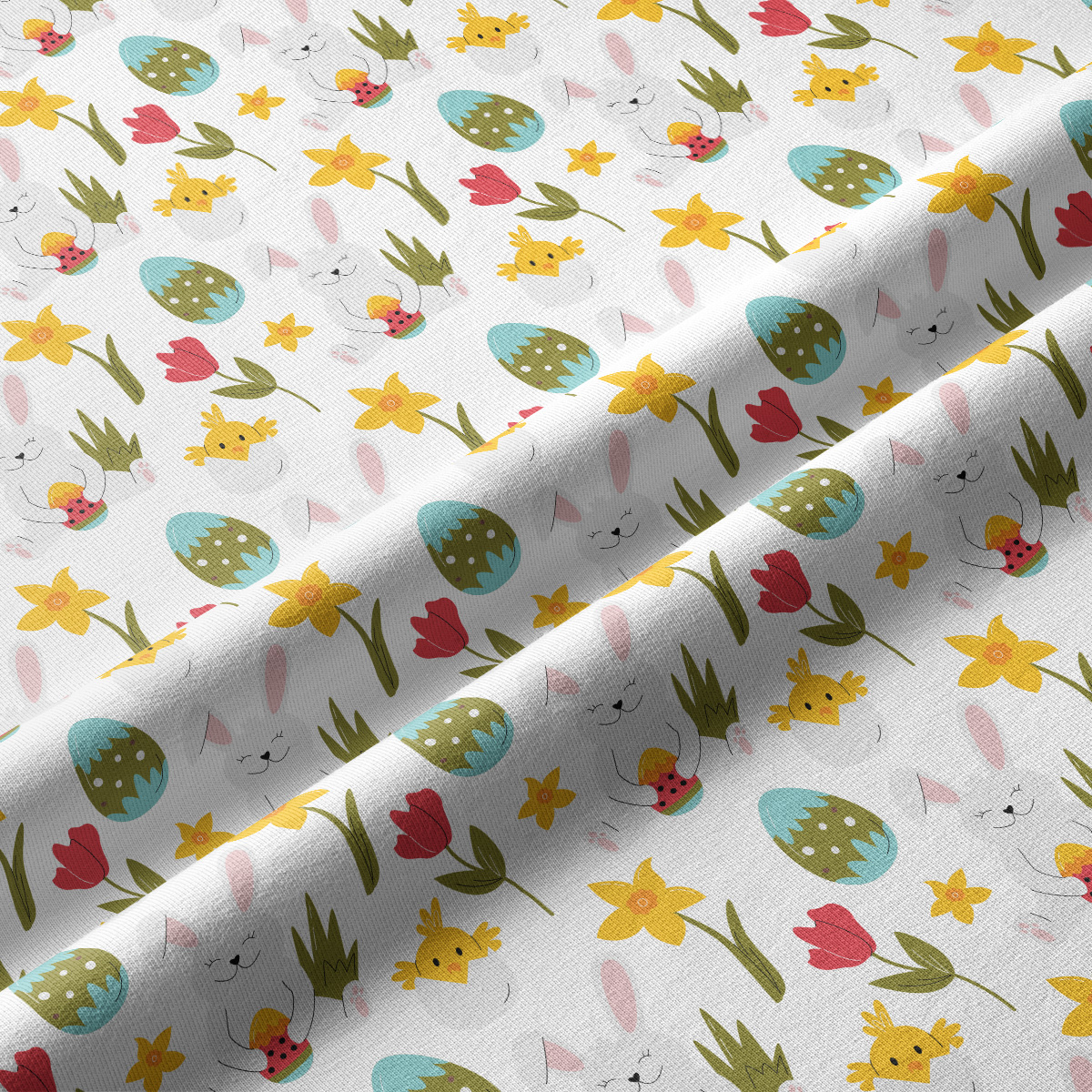 Zbliżenie na fakturę tkaniny i szczegóły nadruku z zajączkami, kurczaczkami i pastelowymi jajkami